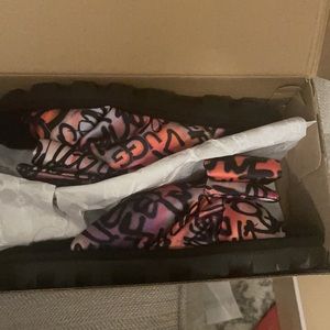 UGG slippers. Brand new never worn in box